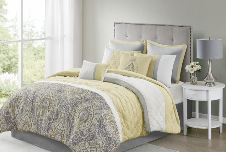 Update your bedroom with the refined elegance of 510 Design’s Shawnee 8 Piece Comforter Set. Showcasing a pieced design with diamond quilting details