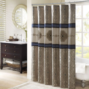 Add a touch of sophistication and elegance to your bathroom with the Donovan shower curtain. This stunning curtain features a bold color-blocked design that is accentuated with intricate embroidery details. The jacquard weave adds depth and texture to the curtain