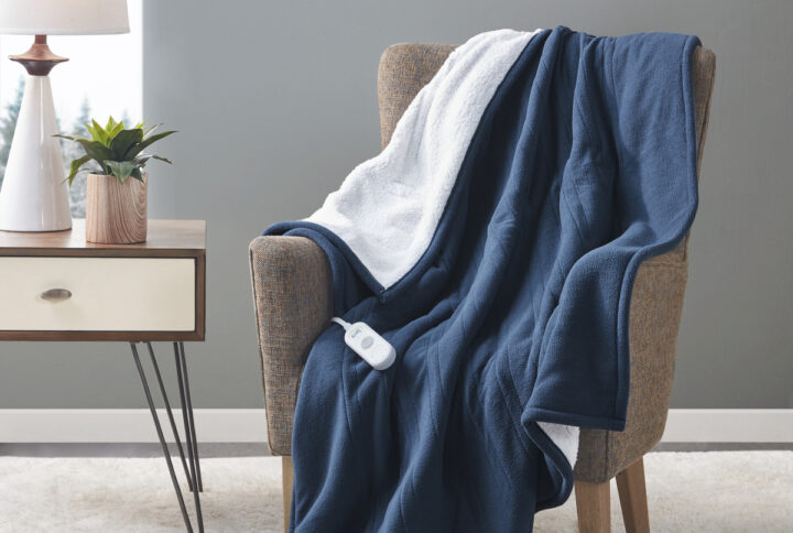 The Serta Fleece to Sherpa Heated Throw offers incredible comfort and warmth to keep you extra cozy while relaxing on your sofa. This heated throw features an ultra-soft fleece face with a cozy Sherpa reverse