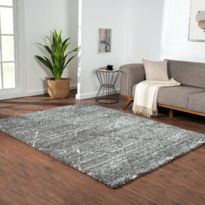 Bring a soft and elegant touch to your home decor with the Madison Park Sophie Talas Shag Area Rug. This machine woven