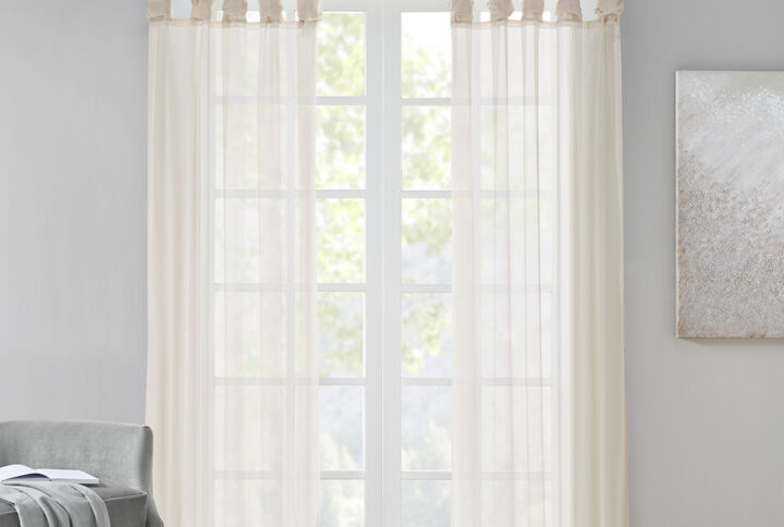 Soften your space with the Madison Park Ceres Twisted Tab Voile Sheer Window Pair. This soft panel pair provides a simple and airy update to your decor