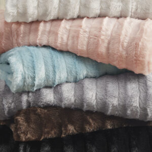 luxurious touch. This throw is light enough for use in the summer