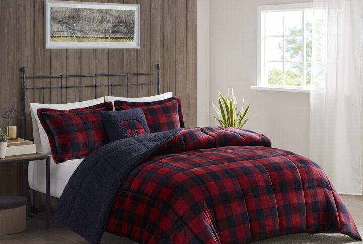 Bring the warmth and comfort of a cabin retreat to your bedroom with the Woolrich Alton Plush to Sherpa Down Alternative Comforter Set. Made from ultra-soft plush and reversing to a cozy berber