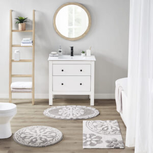 Bring a modern bohemian touch to your space with the Madison Park Casablanca Medallion Cotton Tufted Bath Rug. Featuring an alluring medallion design