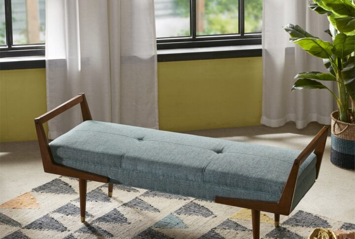 The INK&IVY Boomerang Bench makes an alluring addition to any living room or bedroom. Made with a solid wood frame and high-density foam filling