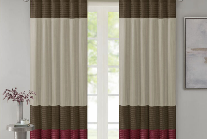 Madison Park Amherst Polyoni Pintuck Window Curtain is a simple way to add style to your room. This window panel features a modern striped design in rich hues of red