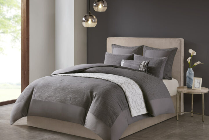 Express your unique style with yarn dyed textural appeal of the N Natori Hanae 3 Piece Comforter Set. The oversized and overfilled grey comforter flaunts a textured fabric that adds dimension to the top of the bed. Two matching shams feature a textured face with a solid reverse to pair beautifully with the comforter