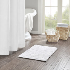 The Madison Park Lasso 100% Cotton Chenille Chain Stitch Rug provides a soft textural update to your bathroom decor. This cotton chenille bath rug features a woven chain stitch design that creates dimension and texture