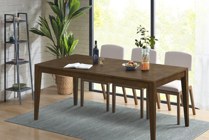 Gather around the INK+IVY Cove modern kitchen table to enjoy good food and company in style. This dining table comfortably seats 6 people or 8 when using the extension leaf