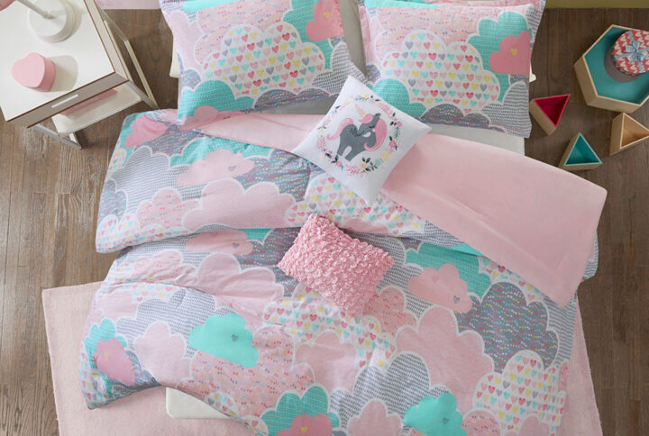 Drift off to dreamland with the whimsical charm of the Urban Habitat Kids Cloud Cotton Printed Comforter Set. The comforter and shams (1 for Twin Sizes) showcase a cute and fluffy cloud motif in a soft colorful palette with a solid reverse. An oblong decorative pillow features all-over ruching and the square pillow features an embroidered unicorn. Made from 100% pre-shrunk cotton