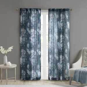 The Madison Park Simone Printed Floral Rod Pocket and Back Tab Top Voile Sheer brings a soft and romantic touch to your home decor. This voile sheer curtain panel features a beautiful blush and neutral printed floral on a dark navy ground for a rich and stylish contrast