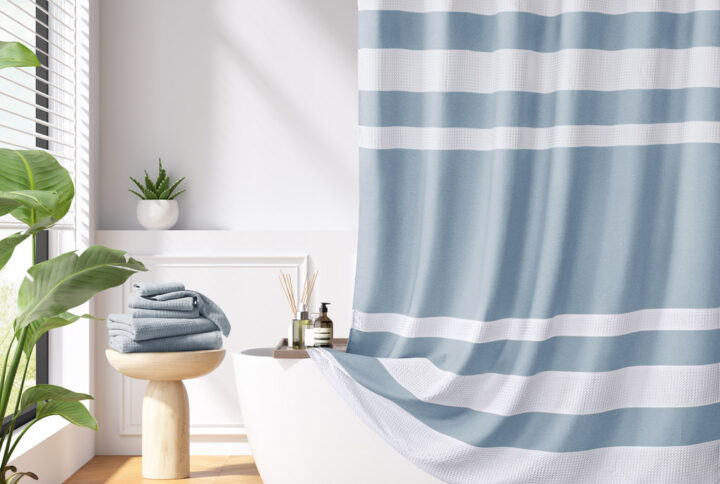 Update your space with the Madison Park Spa Waffle Shower Curtain with 3M Treatment. Featuring a fresh and updated stripe design