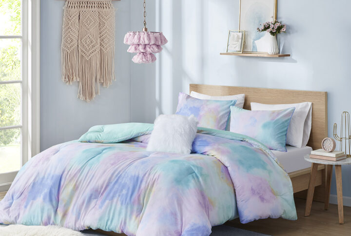 Bring a splash of beautiful colors to your bedroom with the Intelligent Design Cassiopeia Watercolor Tie Dye Printed Comforter Set. This comforter features a watercolor tie dye print with piped edge borders to create a colorful dreamy look. The 2 matching shams (1 in Twin/TwinXL) also have piped edges that pair perfectly with the comforter