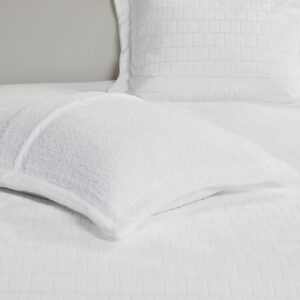 plush comfort with the Laurie Plush to Sherpa Comforter Set. The soft