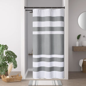 Update your space with the Madison Park Spa Waffle Shower Curtain with 3M Treatment. Featuring a fresh and updated stripe design