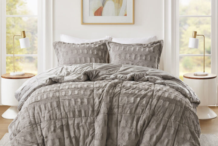 Sleep in the pure softness and comfort of the Madison Park Gia Solid Faux Fur Comforter Mini Set. The ultra-soft comforter flaunts a stylish brushed faux fur on the face that flips to a soft faux mink reverse