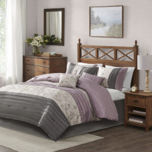 The Serene Bedding Collection provides an elegant look to your home. The top of the comforter is a mix of soft purple