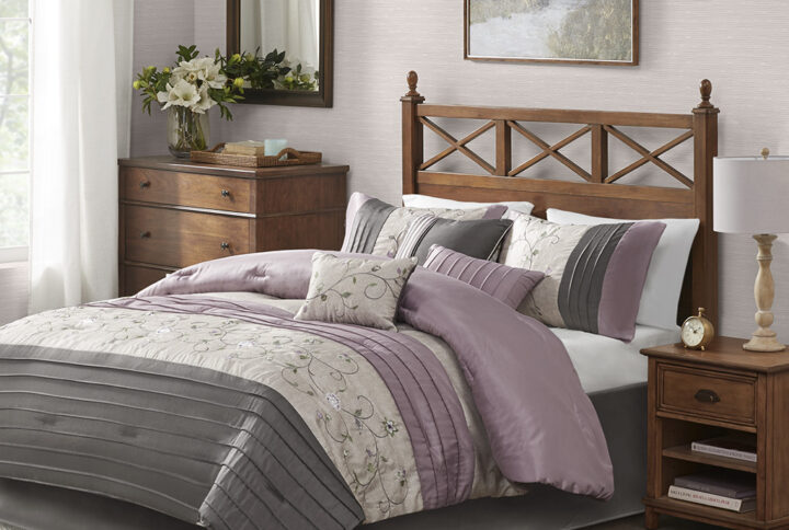 The Serene Bedding Collection provides an elegant look to your home. The top of the comforter is a mix of soft purple