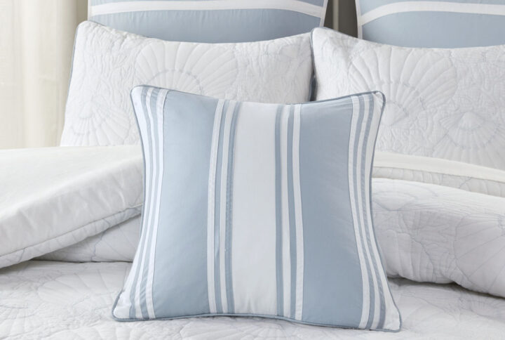 Add a fresh accent to your bedroom with the Harbor House Crystal Beach Pieced Square Pillow. This cotton decorative pillow features a pieced design of solid white and blue fabric