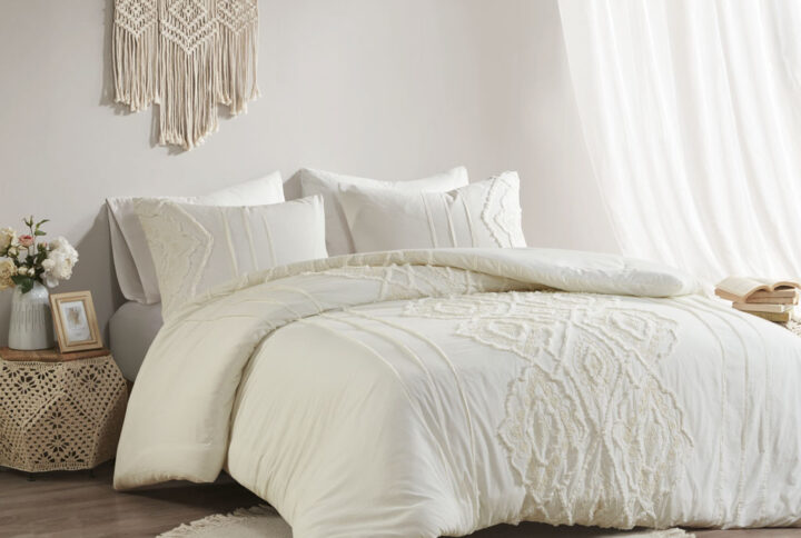 Bring a cozy shabby chic style to your bedroom with the Madison Park Margot 3 Piece Cotton Comforter Set. This 100% cotton comforter flaunts a chenille and embroidered geometric pattern on the off white fabric