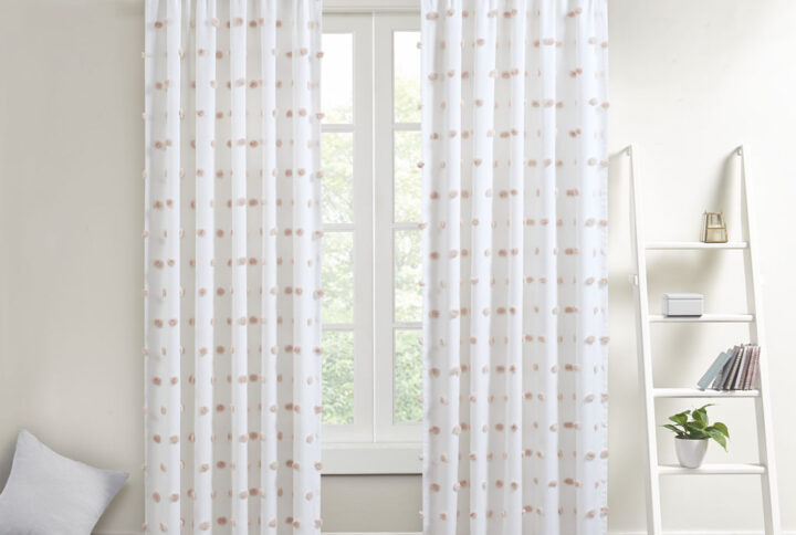 Add a unique and fun style to your bedroom with the Intelligent Design Sophie Pom Pom Embellished Window Panel. This window panel features an all-over clipped soft pompom detailing