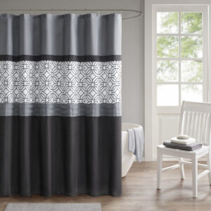 The 510 Design Donnell Embroidered and Pieced Shower Curtain offers a fresh update to your bathroom. A pintucked and pieced design is featured in grey and black hues