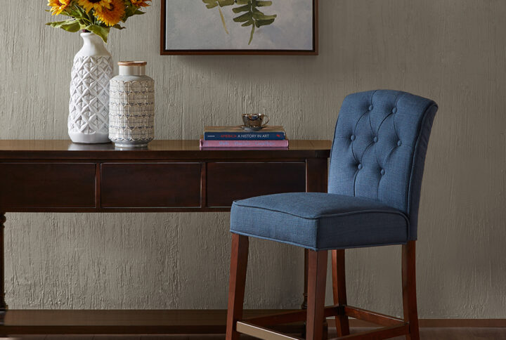 Add a touch of class to your dining decor with the sophisticated Madison Park Marian 26” Tufted Counter Stool. This counter stool uses high-density foam for max comfort that is upholstered in a navy fabric