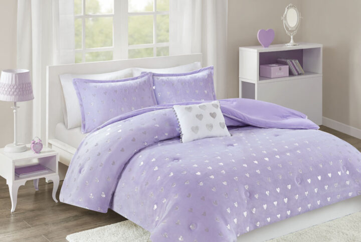 The Mi Zone Rosalie Metallic Printed Plush Comforter Set brings a bright and casual update to your bedroom. A silver metallic heart print adorns the purple plush comforter and shams (1 in Twin/TwinXL) creating a soft and fun look. An oblong decorative pillow with a pompom trim and hearts adds a lovely touch to the bedding set. This bedding set is also OEKO-TEX certified