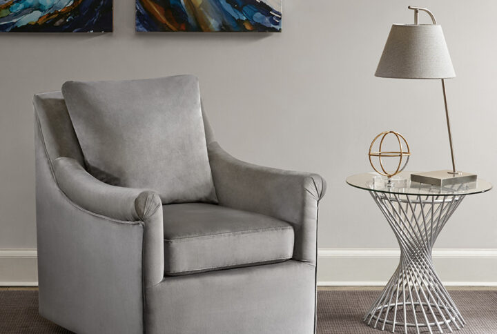 The curved arms and straight back of the Madison Park Deanna Swivel Chair adds a touch of glamour to any space. A high-density foam filling and solid wood frame provide exceptional comfort and support