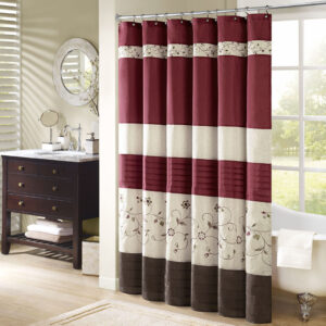 Add an elegant addition to your bathroom with the Madison Park Serene shower curtain. Its rich red and delicate embroidery are the perfect combination. This shower curtain is machine washable for easy care. Various sizes are available to fit any bathroom space.Complete the look with coordinating bedding available and sold separately.