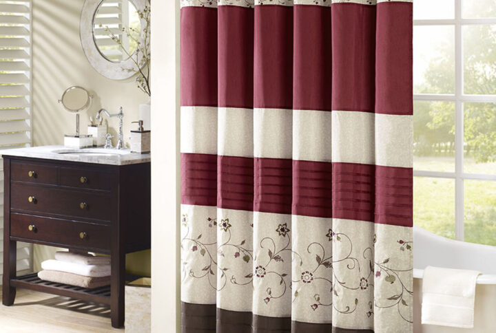 Add an elegant addition to your bathroom with the Madison Park Serene shower curtain. Its rich red and delicate embroidery are the perfect combination. This shower curtain is machine washable for easy care. Various sizes are available to fit any bathroom space.Complete the look with coordinating bedding available and sold separately.