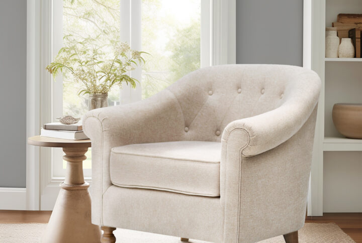 Add a touch of timeless elegance to your space with the Martha Stewart Fayette Accent Chair. Part of the Bedford collection