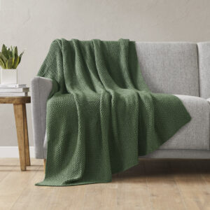 Bundle up in the warm and cozy comfort of the INK+IVY Bree Knit Throw. This ultra-soft