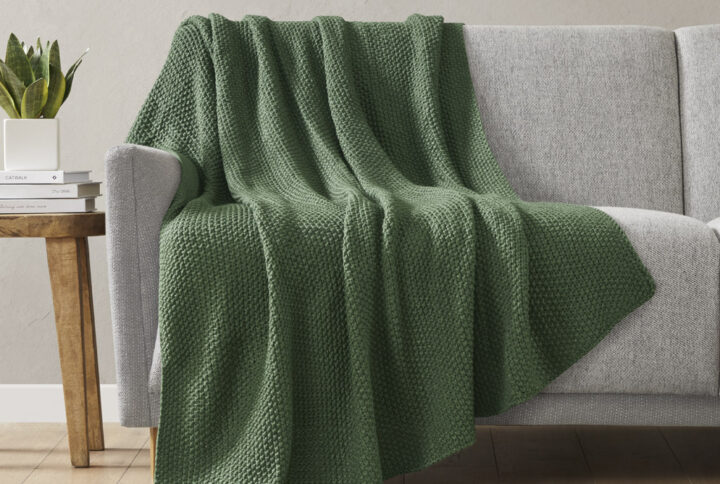 Bundle up in the warm and cozy comfort of the INK+IVY Bree Knit Throw. This ultra-soft