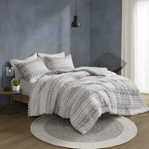 The Urban Habitat Rowan comforter set features cationic dyed stripes and clip jacquard pompom details that bring a perfect blend of modern and casual style to your bedroom. The comforter has a soft microfiber reverse