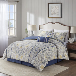 Elevate your bedroom with the refined allure of the Harbor House Livia 6 Piece Cotton Comforter Set. The 100% cotton slub comforter showcases a botanical print