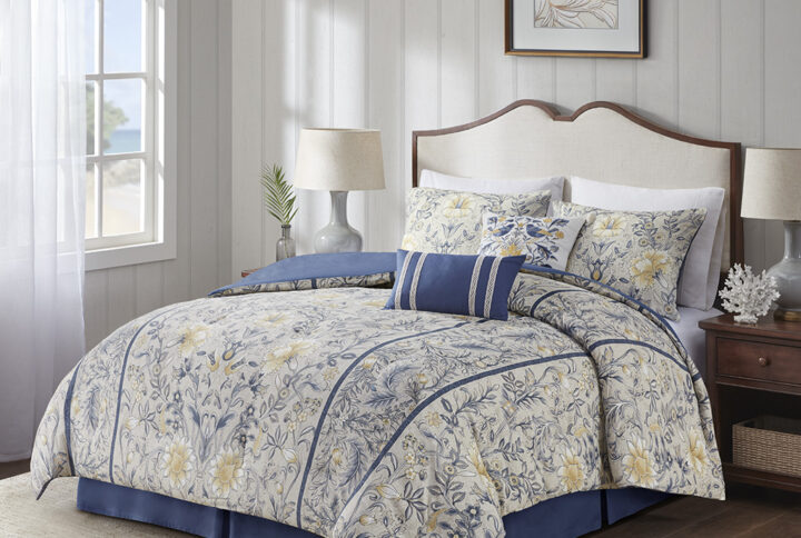 Elevate your bedroom with the refined allure of the Harbor House Livia 6 Piece Cotton Comforter Set. The 100% cotton slub comforter showcases a botanical print