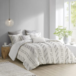 The INK+IVY Kara Cotton Jacquard Comforter Mini Set offers an eye-catching update to your bedroom decor. This comforter features a 100% cotton jacquard striped design on the face with a Light Grey diamond print on the Ivory reverse. The comforter also has a clean