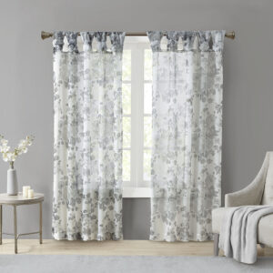 The Madison Park Simone Printed Floral Twist Tab Top Voile Sheer brings a soft and romantic touch to your home decor. This voile sheer curtain panel features a neutral printed floral on a white ground for a rich and stylish contrast