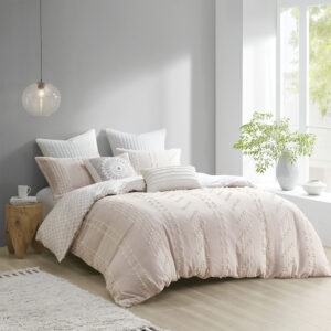 The INK+IVY Kara Cotton Jacquard Duvet Cover Mini Set offers an eye-catching update to your bedroom decor. This duvet cover features a cotton jacquard stripe design on the face with a blush diamond print on the ivory reverse. Two matching shams coordinate with the duvet cover to complete to globally-inspired design. This comforter is OEKO-TEX certified