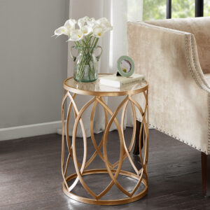 This metal accent table adds just the right amount of transitional appeal to your décor. Featuring a glass table top and geometric base