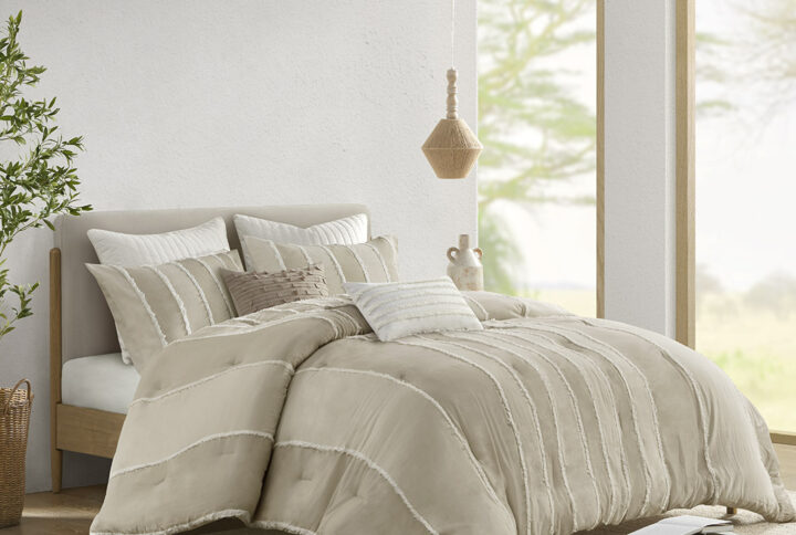 Embrace the effortless charm of our boho-inspired bedding set. This collection includes 100% cotton comforter and 2 matching shams