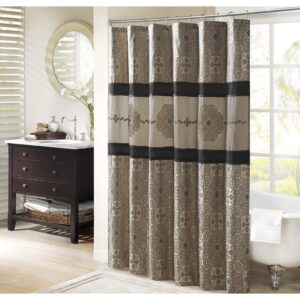 Add a touch of sophistication and elegance to your bathroom with the Donovan shower curtain. This stunning curtain features a bold color-blocked design that is accentuated with intricate embroidery details. The jacquard weave adds depth and texture to the curtain