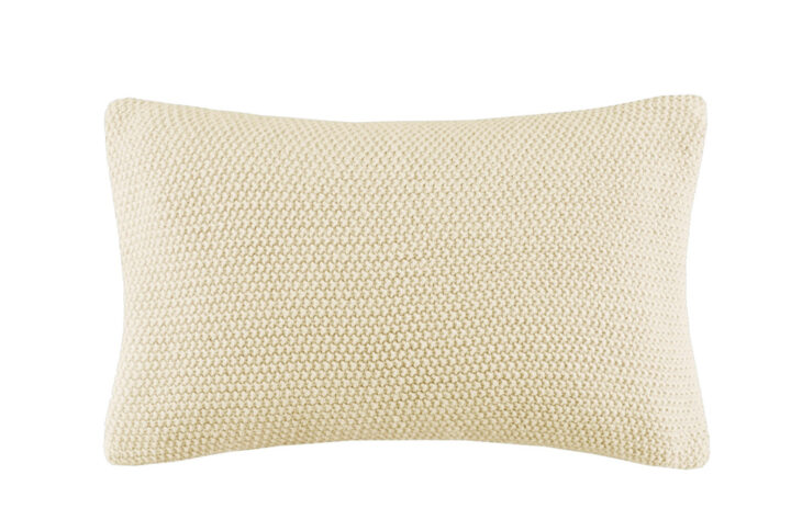 The INK+IVY Bree Knit Oblong Pillow Cover offers a simple and cozy addition to your living room or bedroom decor. This knit pillow cover is made from ultra-soft acrylic to create a casual cottage look. A hidden zipper closure provides a clean finished edge to the design. Machine washable for easy care