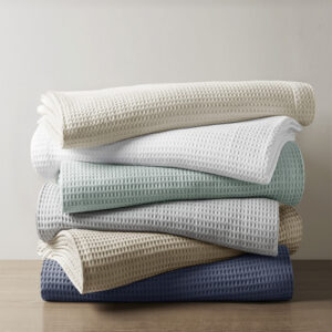 this lightweight blanket features tightly woven waffle weave that reduces pilling. The waffle weave also helps reduce shrinkage after washing and the breathable cotton makes this blanket perfect for your year round warmth. Machine washable for easy care