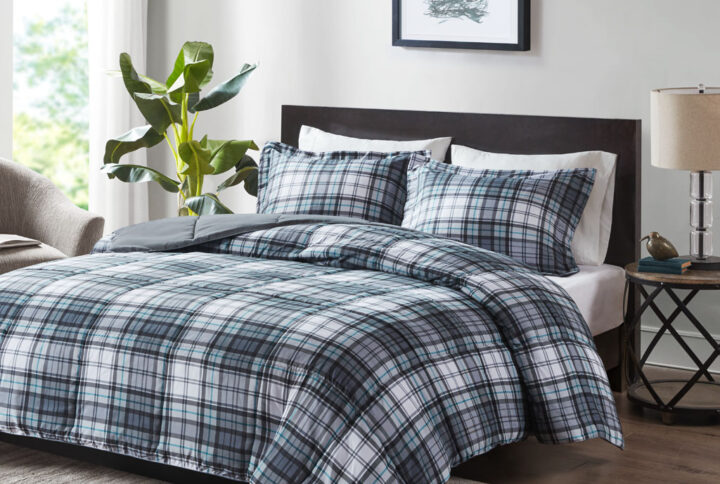 Sleep comfortably with the Madison Park Essentials Parkston 3M Scotchgard Down Alternative Comforter Mini Set. Sporting a cool plaid pattern