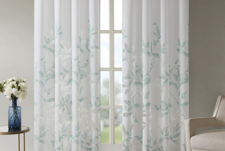 Transform any room with the beauty of our Madison Park Cecily Printed Window Panel. The gorgeous panel flaunts a stunning all over grey botanical design burned out for a dimensional and fresh update. Finished with silver grommet tops for easy hanging