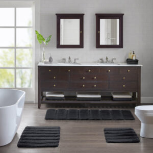 Transform your bathroom into a simple and stylish haven with our Madison Park Tufted Pearl Channel Rug. This solid tufted bath rug features a high-low stripe design with a light sheen and luster that adds rich dimension and texture for the perfect shabby chic touch your bathroom decor. Constructed from 100% macro-spun polyester fibers