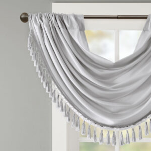 with our Elena Waterfall window valance. This classy silver valance showcases rich center draping details and a beautiful tassel trim