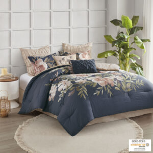 Bring beauty and graceful style to your bedroom with the Madison Park Camillia 8 Piece Cotton Comforter Set. The navy comforter and 2 matching shams feature a large blush floral print to create a stunning shabby chic look. A solid blush reverse adds a soft touch of color to contrast the face of the comforter. The 2 blush Euro shams flaunt a ruffled texture that adds dimension to the bed